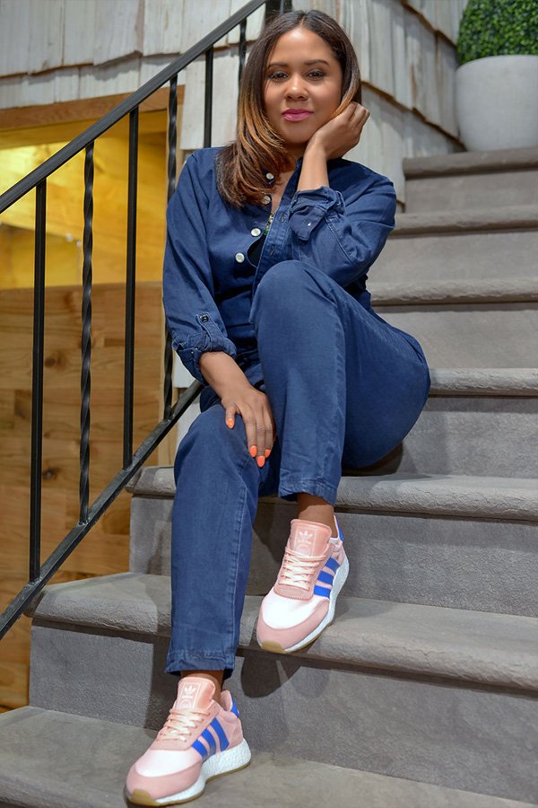 Audience members seated inside WOODstack IVY during an Angela Yee Book Club event in Brooklyn, an early community program that informed the WellRead nonprofit brand strategy.