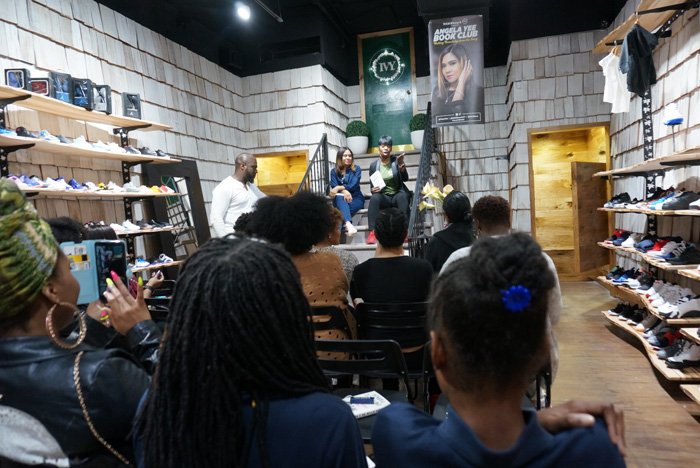 Audience members seated inside WOODstack IVY during an Angela Yee Book Club event in Brooklyn, an early community program that informed the WellRead nonprofit brand strategy.