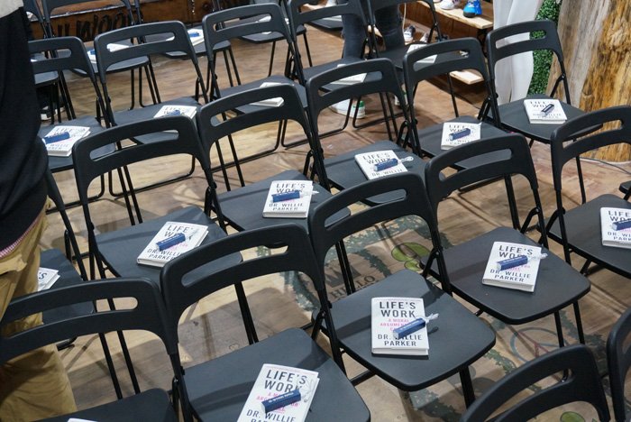 Audience members seated inside WOODstack IVY during an Angela Yee Book Club event in Brooklyn, an early community program that informed the WellRead nonprofit brand strategy.