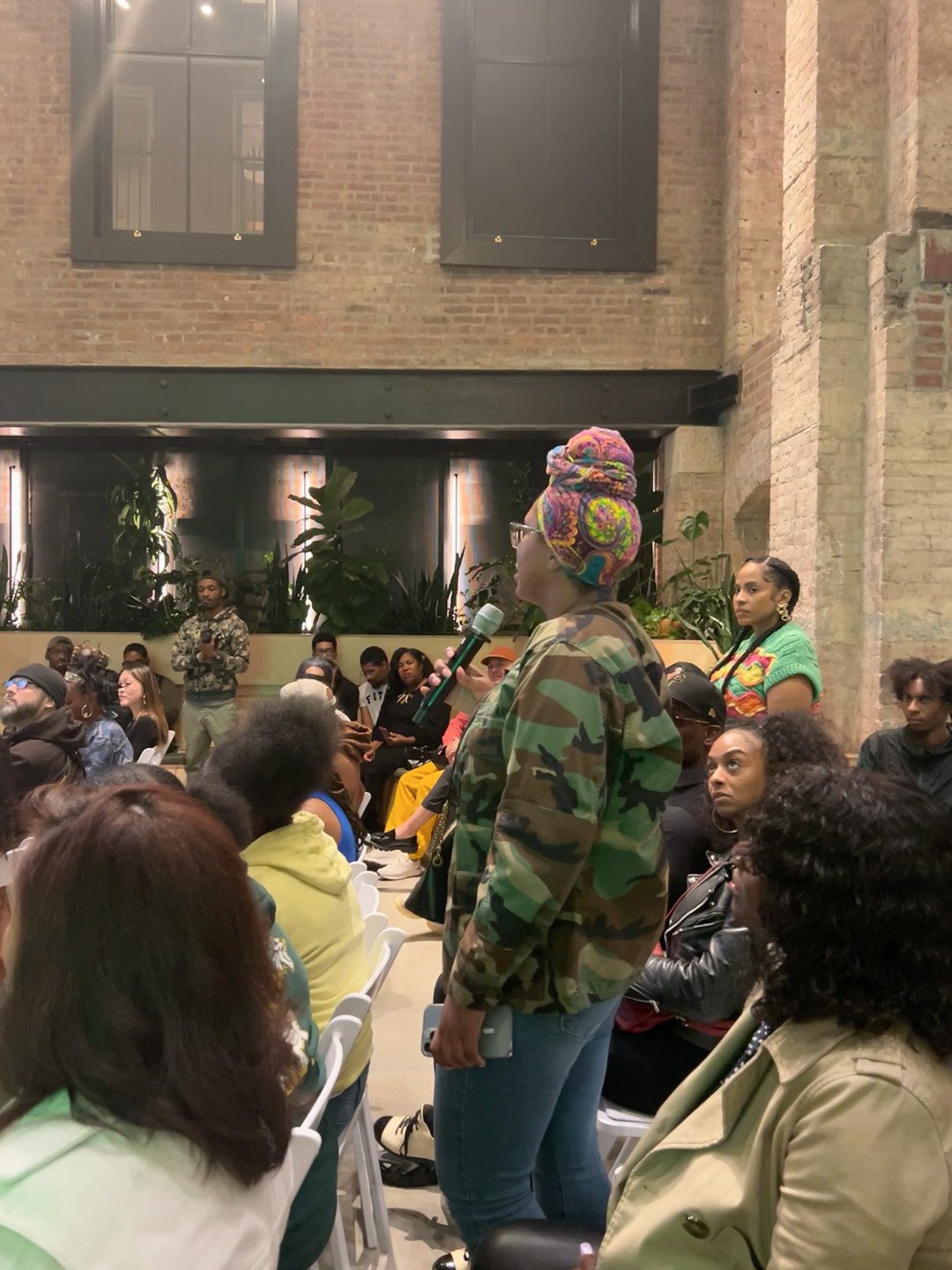 Guests engaging with chefs during the Coffee Uplifts People NYCWFF PreHeat experience at Shopify NYC.