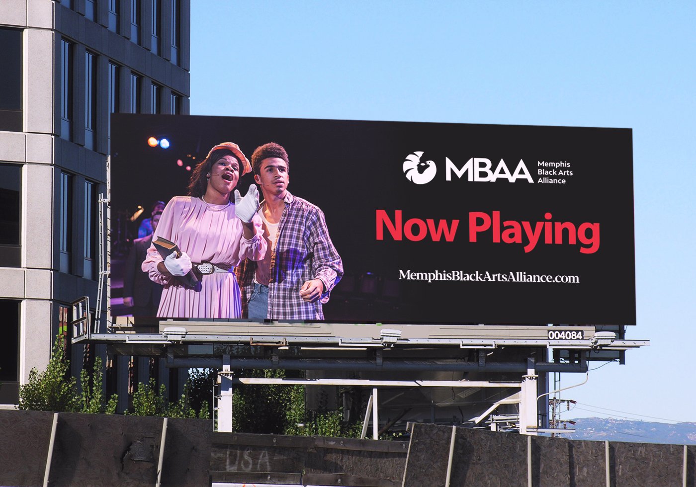 Memphis Black Arts Alliance billboard showing the refreshed logo, MBAA wordmark, and Now Playing message for a performing arts campaign.