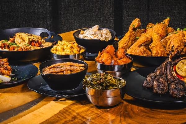 Kitchen + Kocktails Philadelphia menu with fried chicken, steak and Southern dishes.